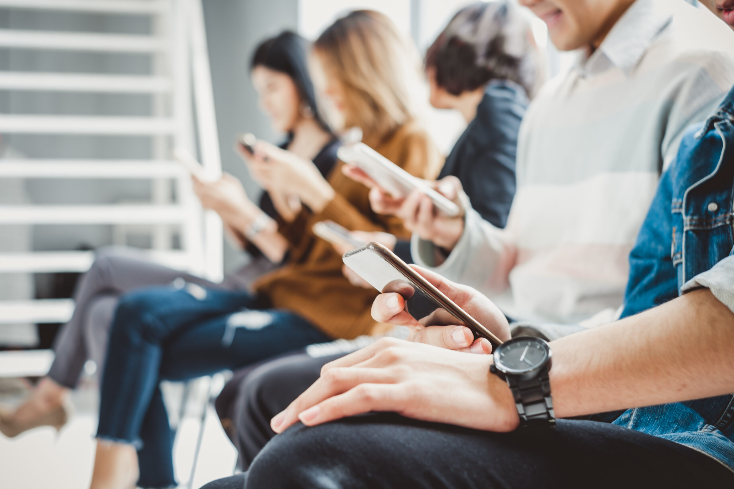 A group of consumers using social media platforms.